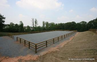 3 Board Fence with a forth board at the bottom in this arena